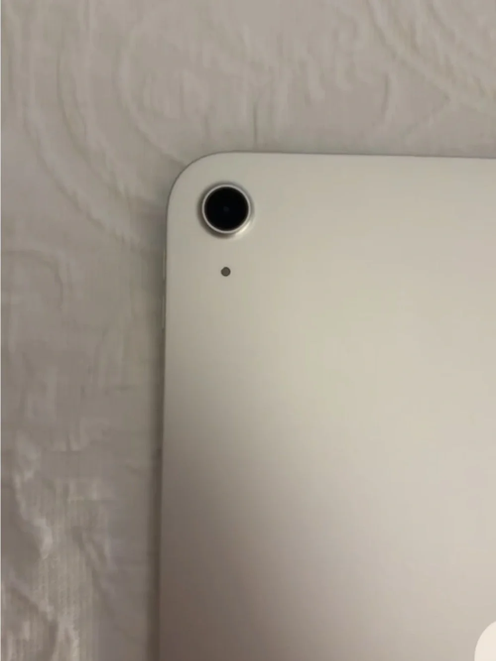 Apple Silver Tablet with Rear Camera and Apple Logo